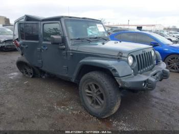  Salvage Jeep Wrangler