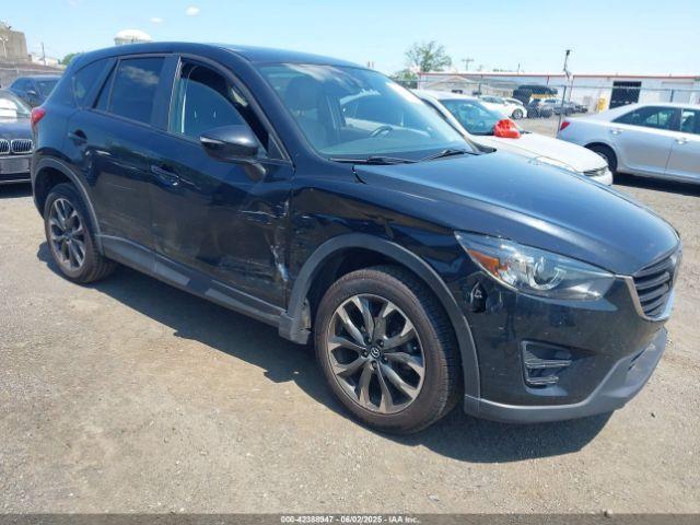  Salvage Mazda Cx